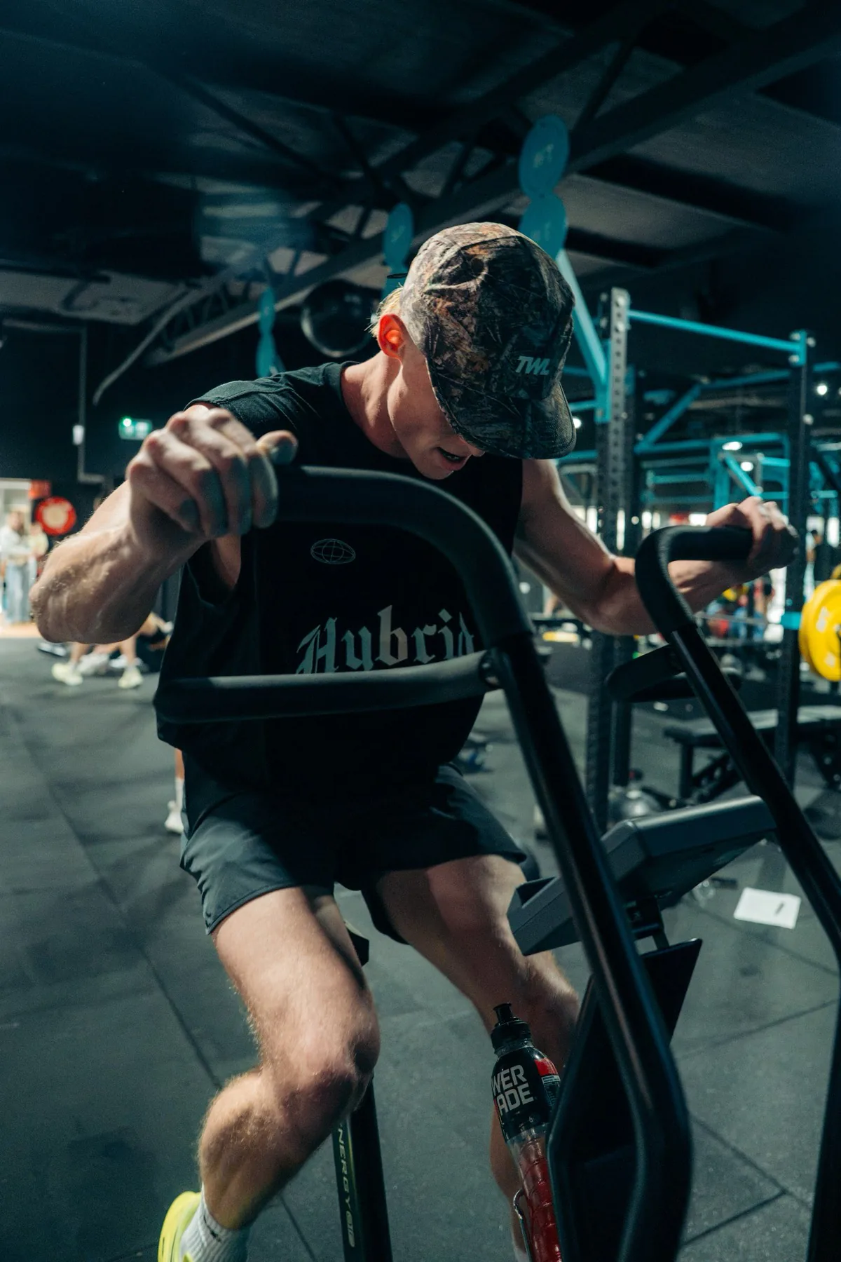 Two BFT Leichhardt members training on cardio equipment